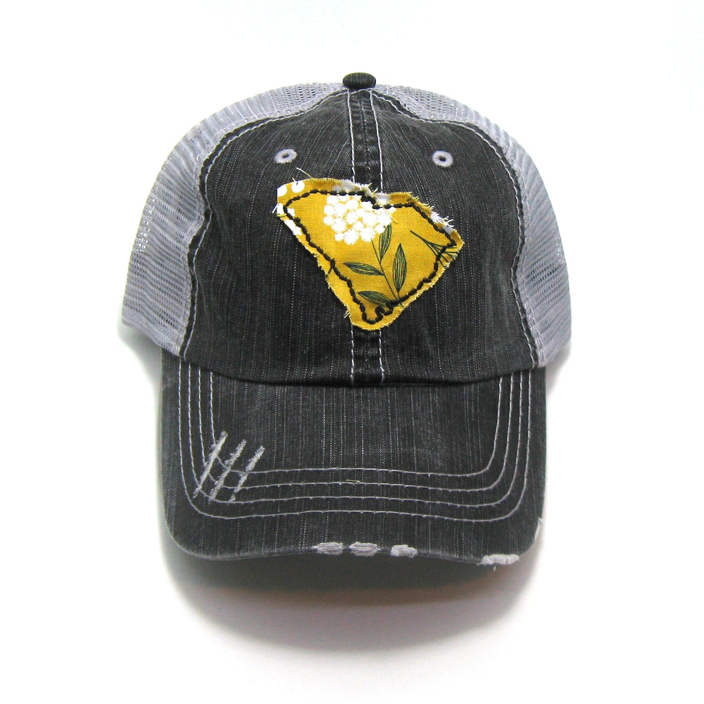 gray distressed trucker hat with gray floral fabric state of South Carolina