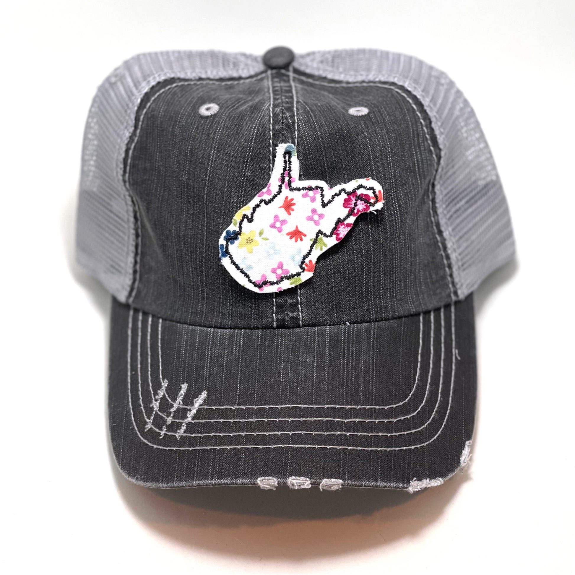 gray distressed trucker hat with gray floral fabric state of West Virginia