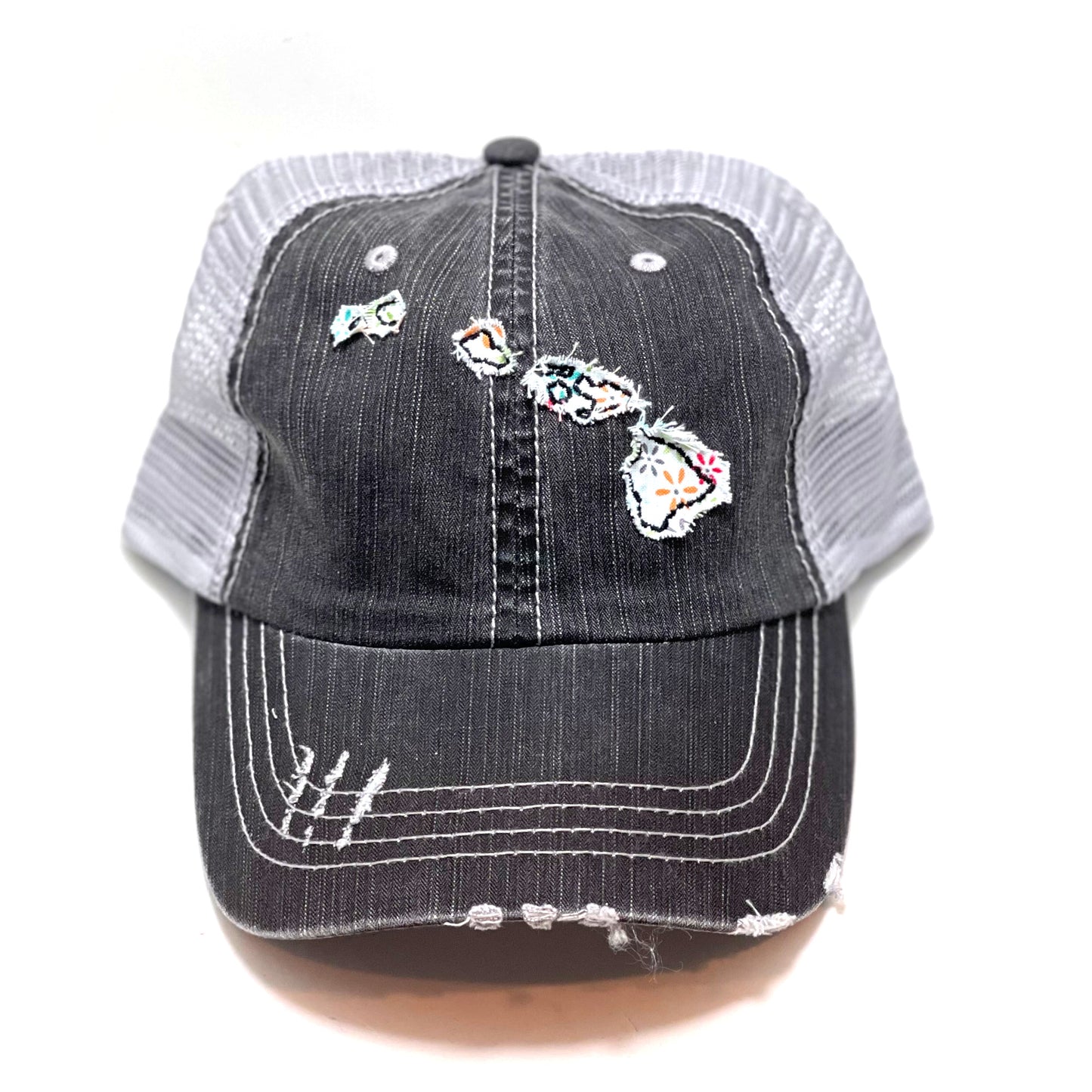 gray distressed trucker hat with gray floral fabric state of Hawaii