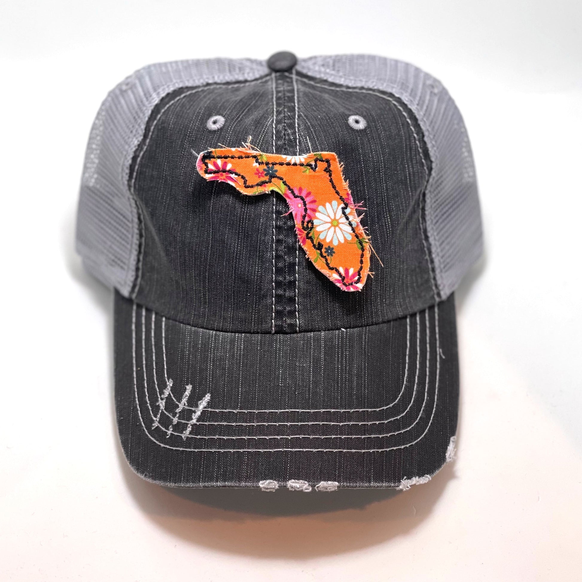 gray distressed trucker hat with gray floral fabric state of Florida