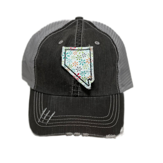 gray distressed trucker hat with gray floral fabric state of Nevada