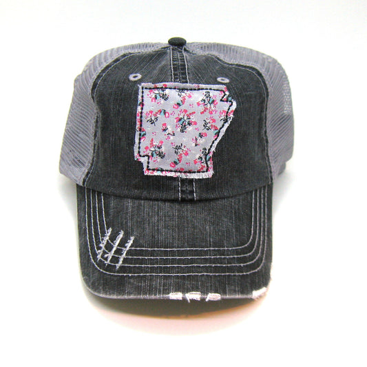 gray distressed trucker hat with gray floral fabric state of Arkansas